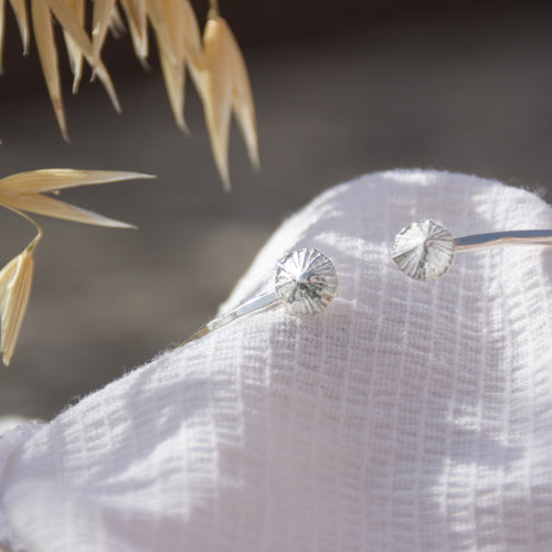 Beach Limpets - Saltwater Souls fine silver (.999) cast limpet shells on a hammered effect recycled sterling silver open bangle.