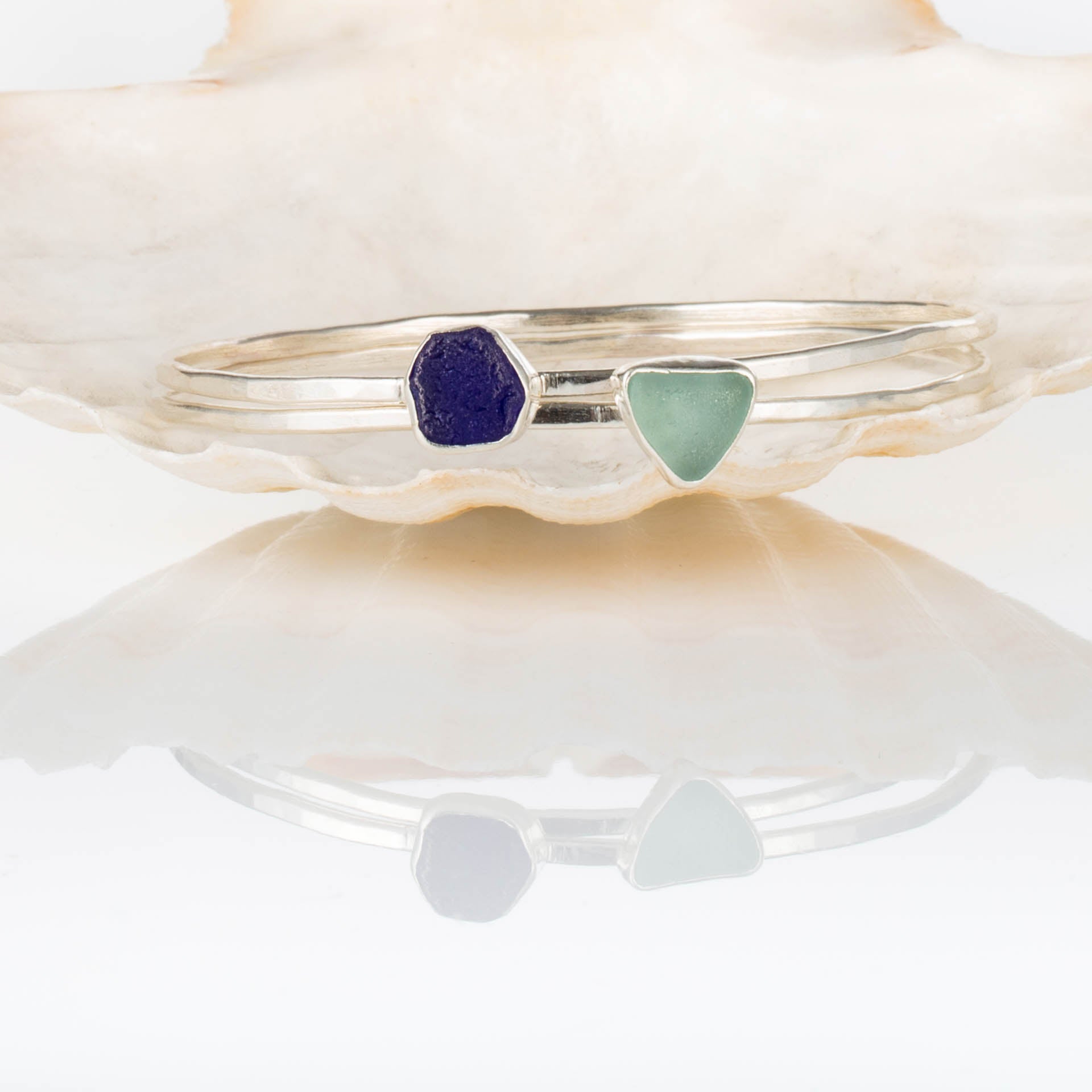 Blue Tides - Saltwater Souls sea glass hammered effect bangle, handcrafted with recycled sterling silver.