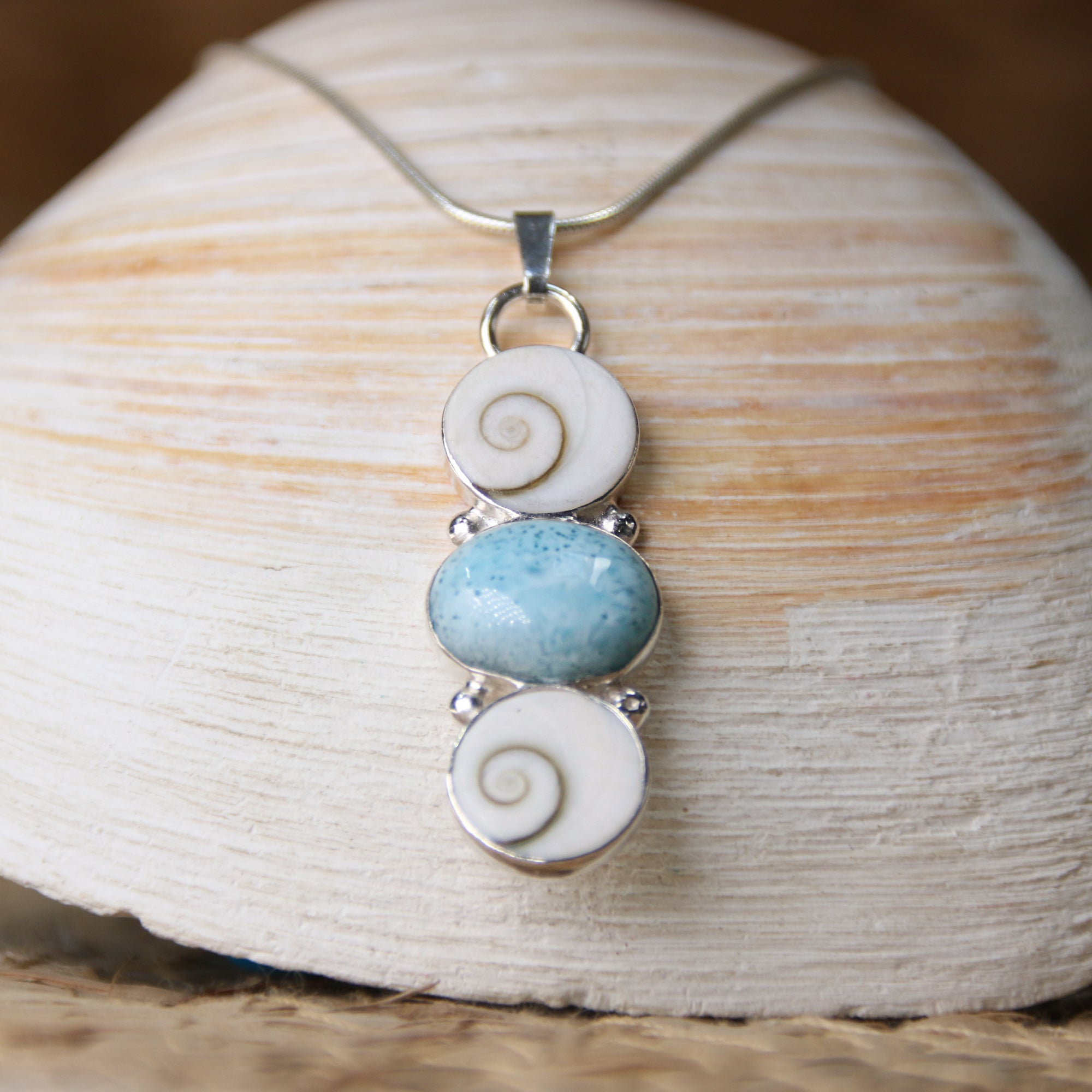 Changing Tides - Saltwater Souls larimar and shiva shell triplet necklace.