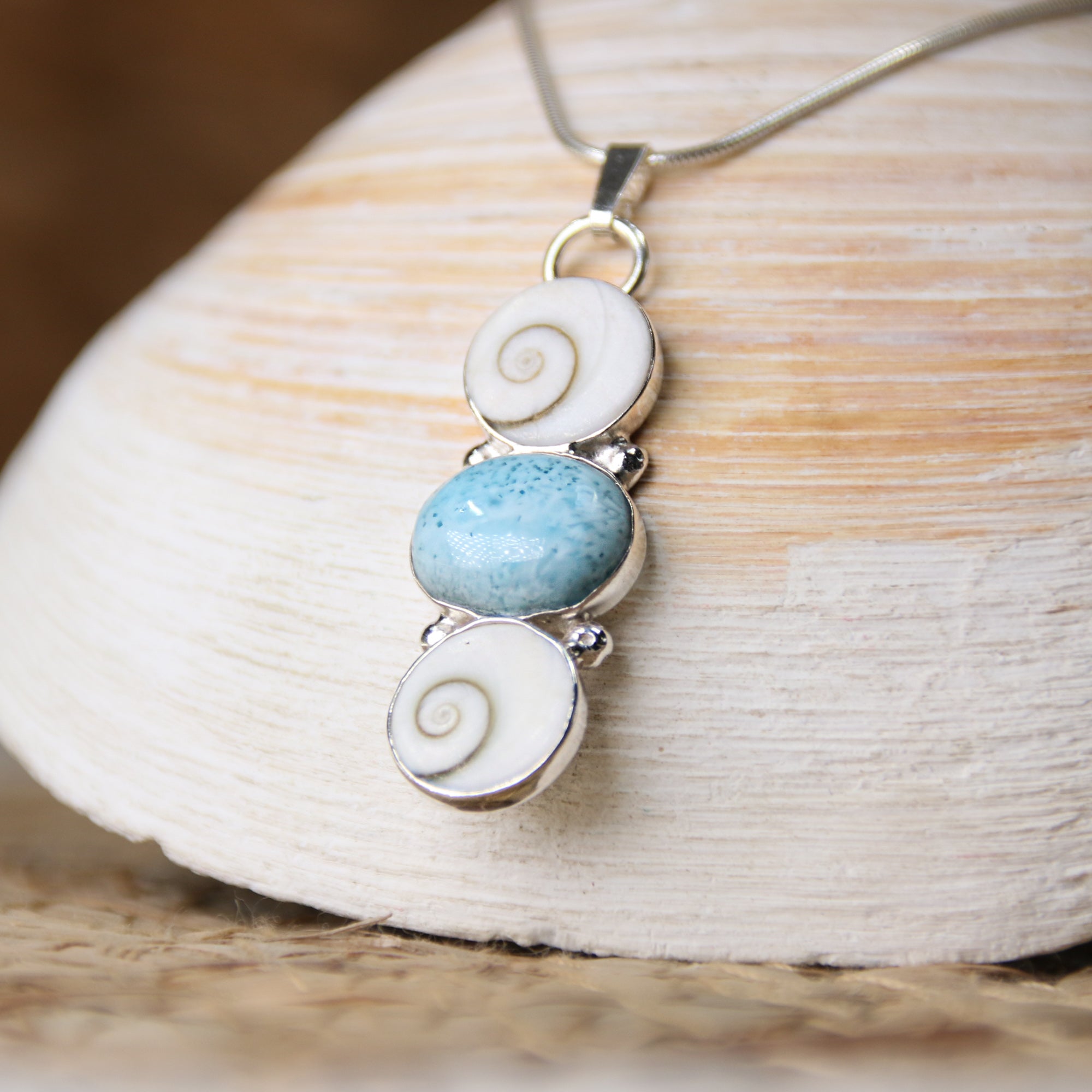 Changing Tides - Saltwater Souls larimar and shiva shell triplet necklace.