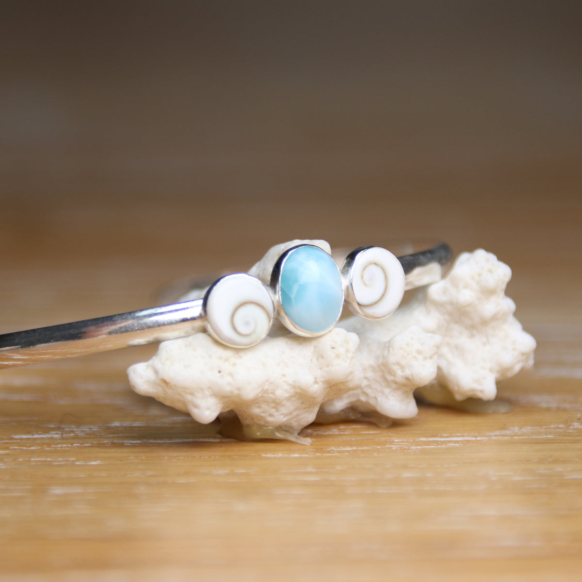 Changing Tides Bangle - Saltwater Souls larimar and shiva shell recycled sterling silver open back bangle.