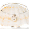 Cowrie Reef - A handmade hammered recycled sterling silver 925 bangle decorated with an upcycled cowrie shell.