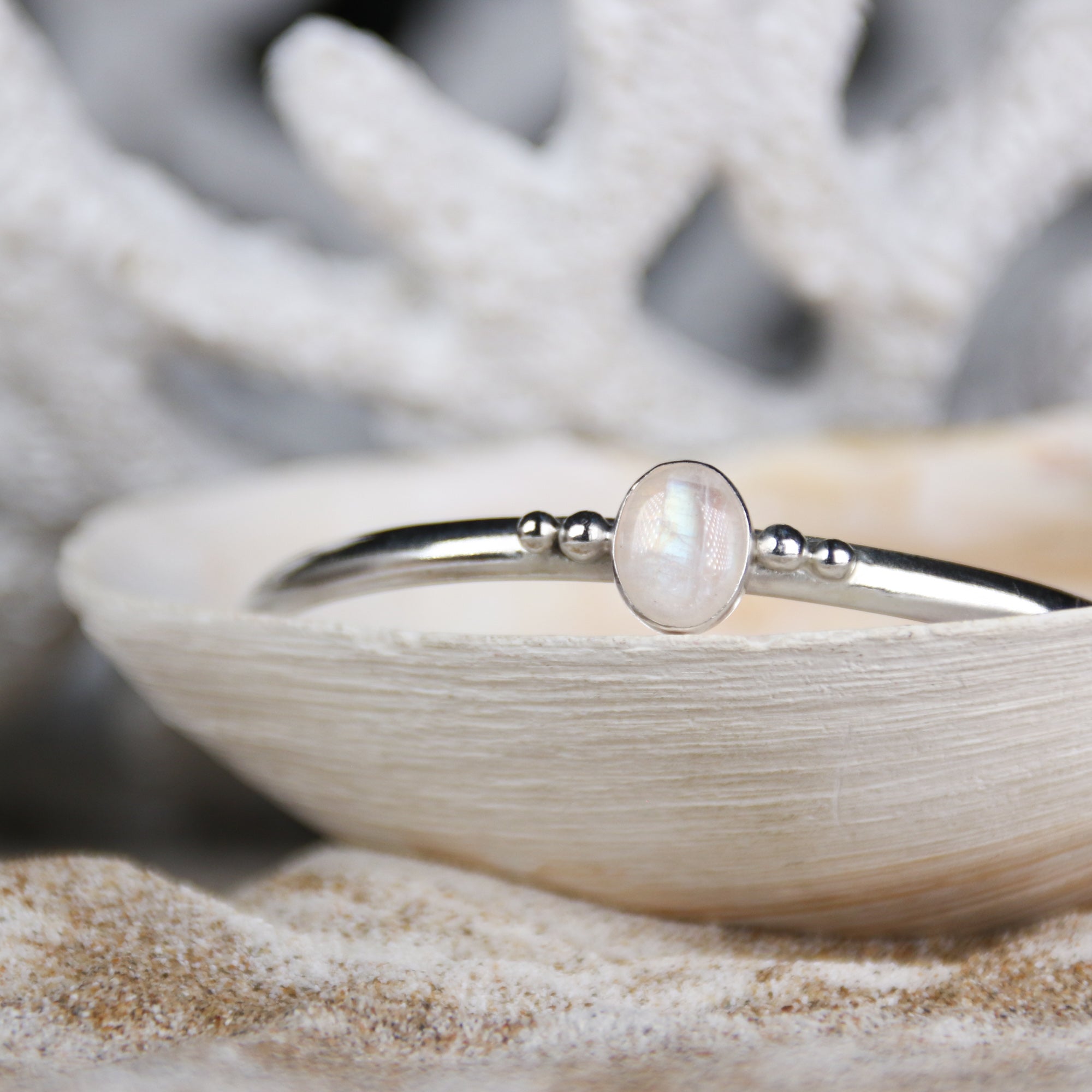 Free Mind - Saltwater Souls rainbow moonstone open bangle handcrafted with recycled sterling silver.