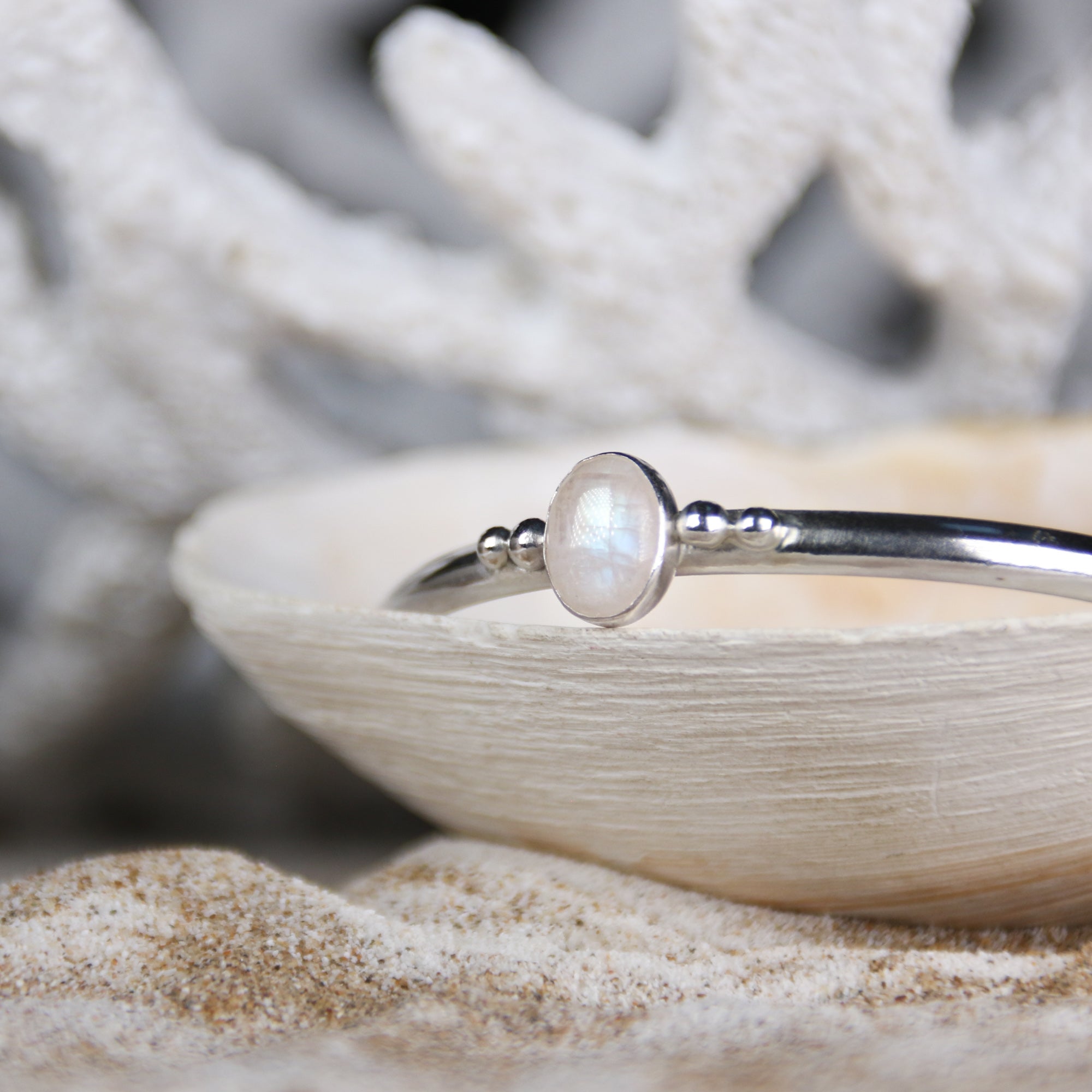 Free Mind - Saltwater Souls rainbow moonstone open bangle handcrafted with recycled sterling silver.