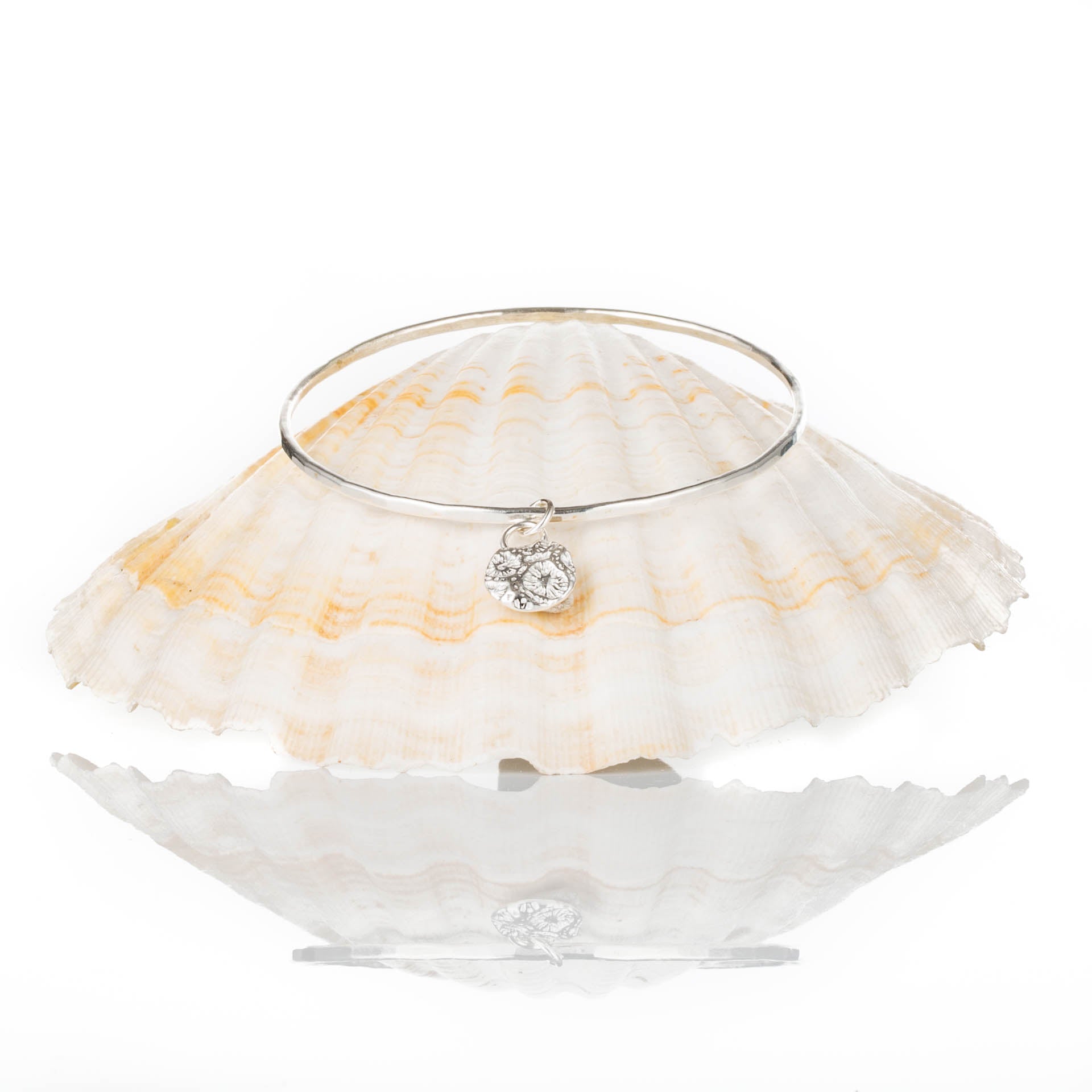 Little Coral Bangle - Saltwater Souls fine silver (.999) cast coral texture charm on a hammered recycled sterling silver bangle.