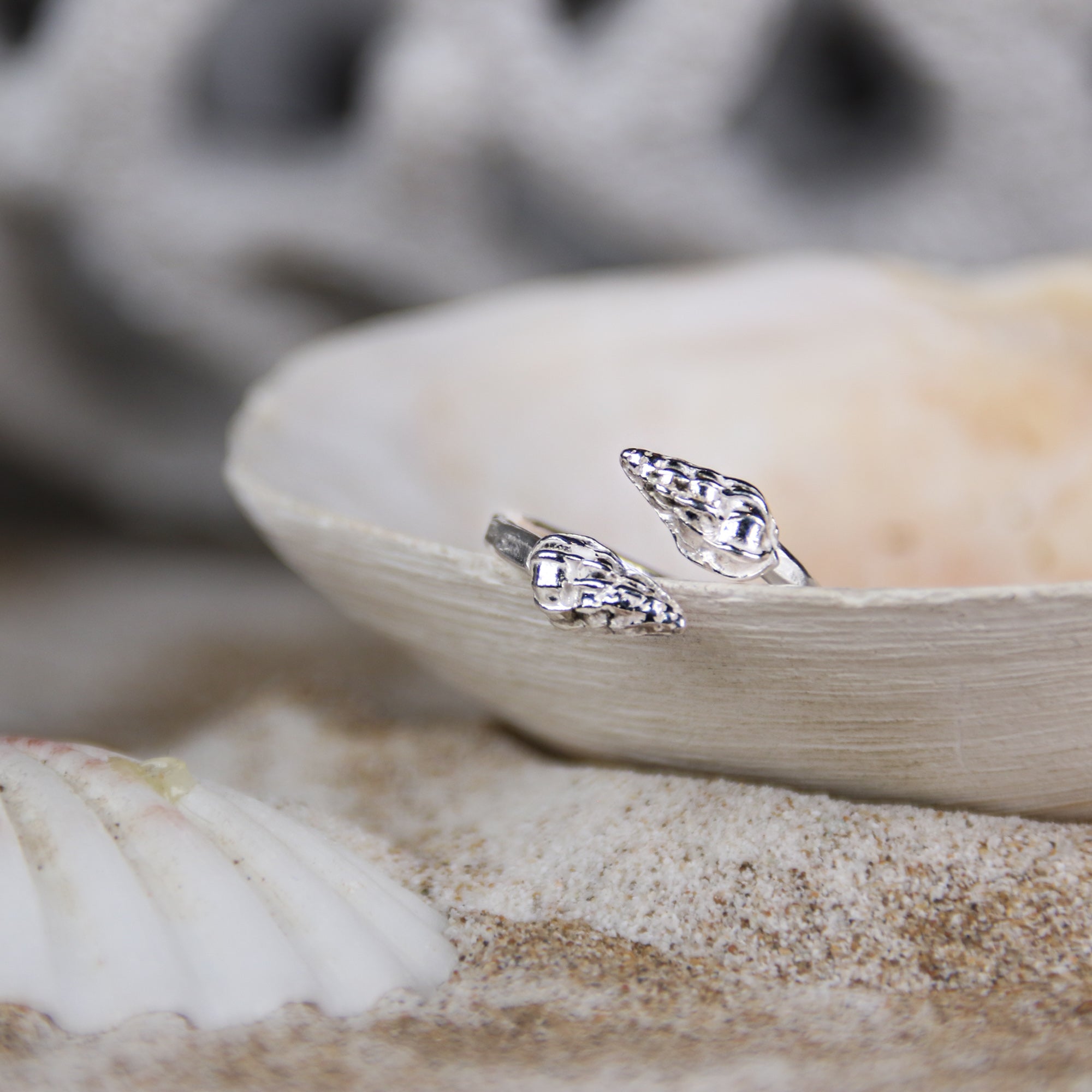 Matilda's Wentletrap Ring - Saltwater Souls fine silver (.999) cast wentletrap shells found at Barricane Beach, North Devon, on a hammered effect recycled sterling silver adjustable ring.