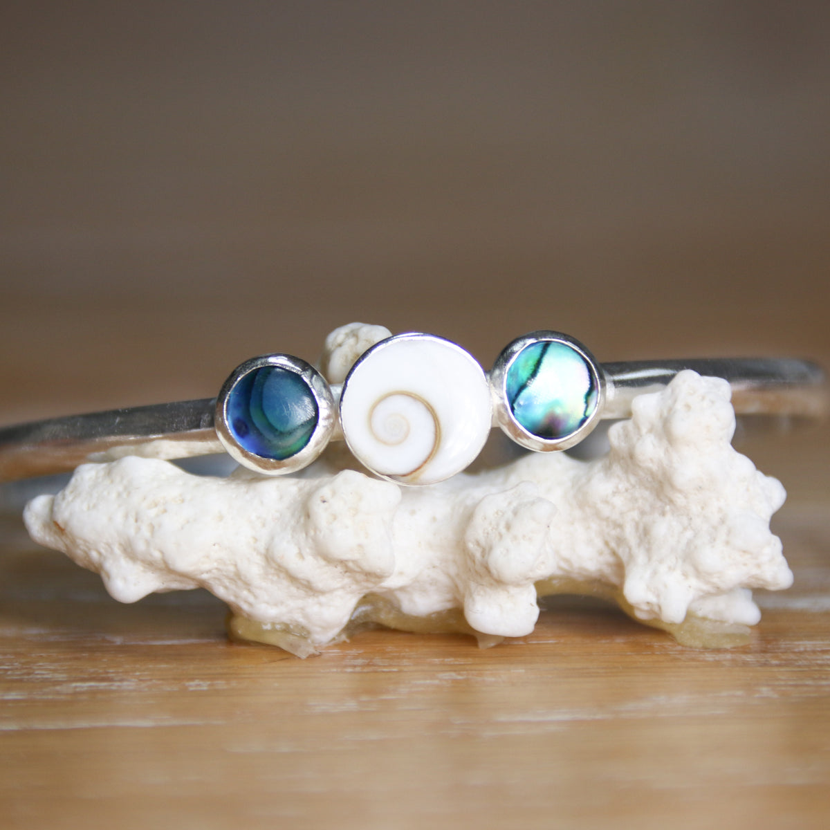 Ocean Aura - Saltwater Souls shiva shell and paua shell recycled sterling silver open back bangle.