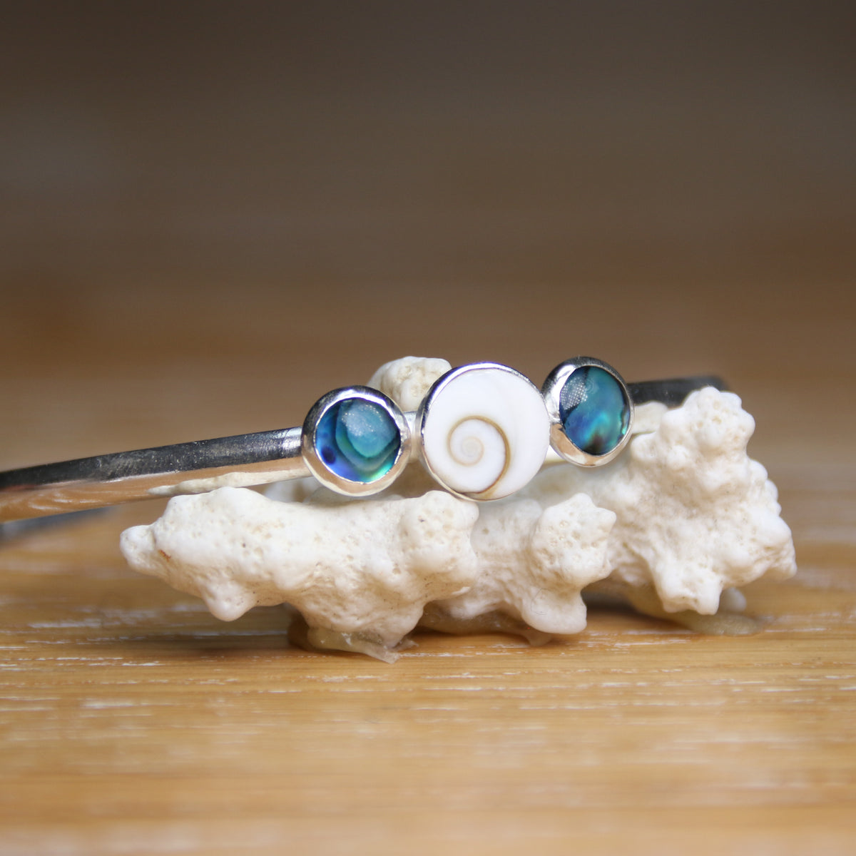 Ocean Aura - Saltwater Souls shiva shell and paua shell recycled sterling silver open back bangle.