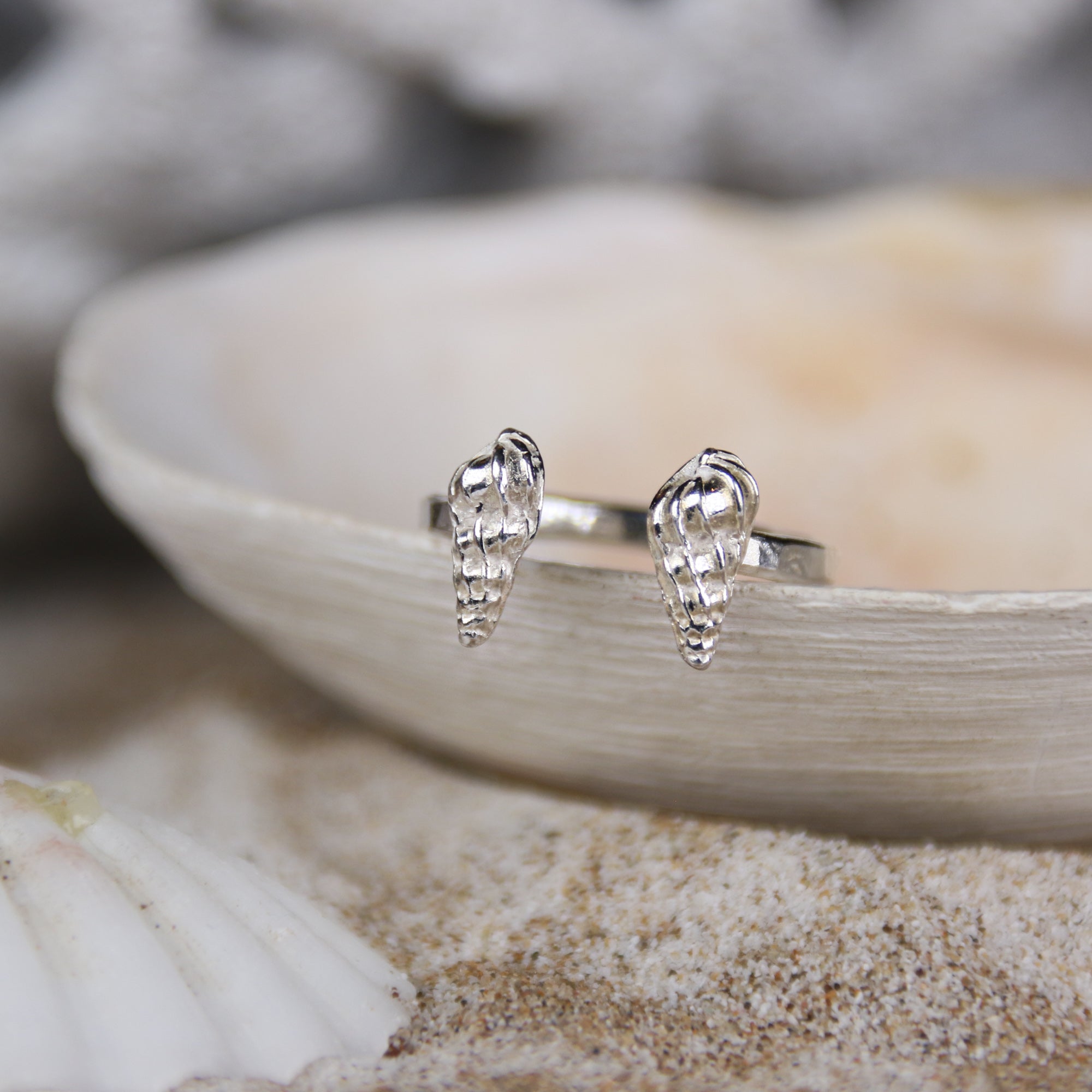 Seashells - Wentletraps - Saltwater Souls fine silver (.999) cast wentletrap shells found at Barricane Beach, North Devon, on recycled sterling silver open adjustable ring.