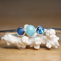 Tidal Pull - Saltwater Souls larimar and paua shell recycled sterling silver open back bangle.