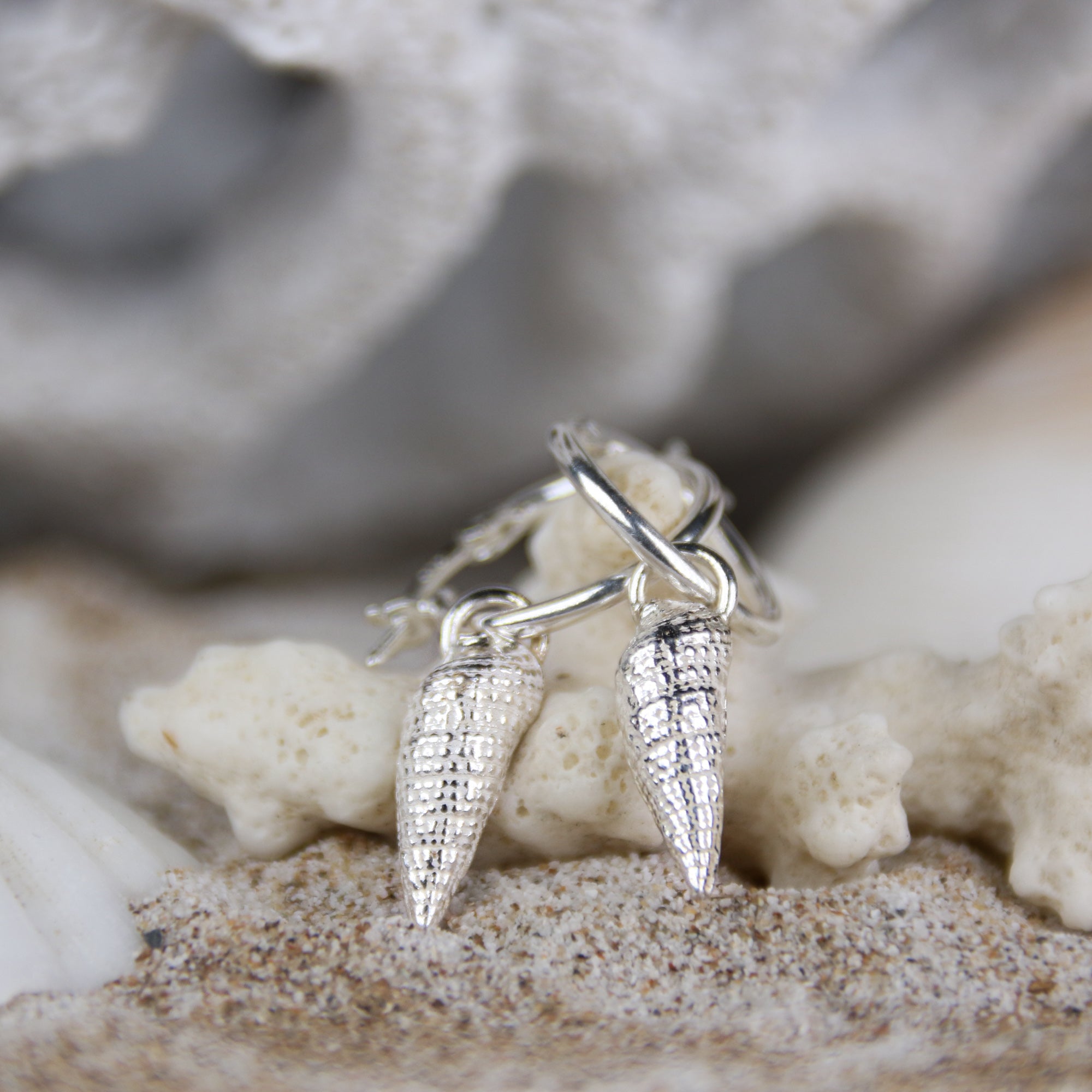 Tide Line Hoops - Two beautiful auger shells cast in fine silver (0.999) creating a unique pair of hoop earrings.