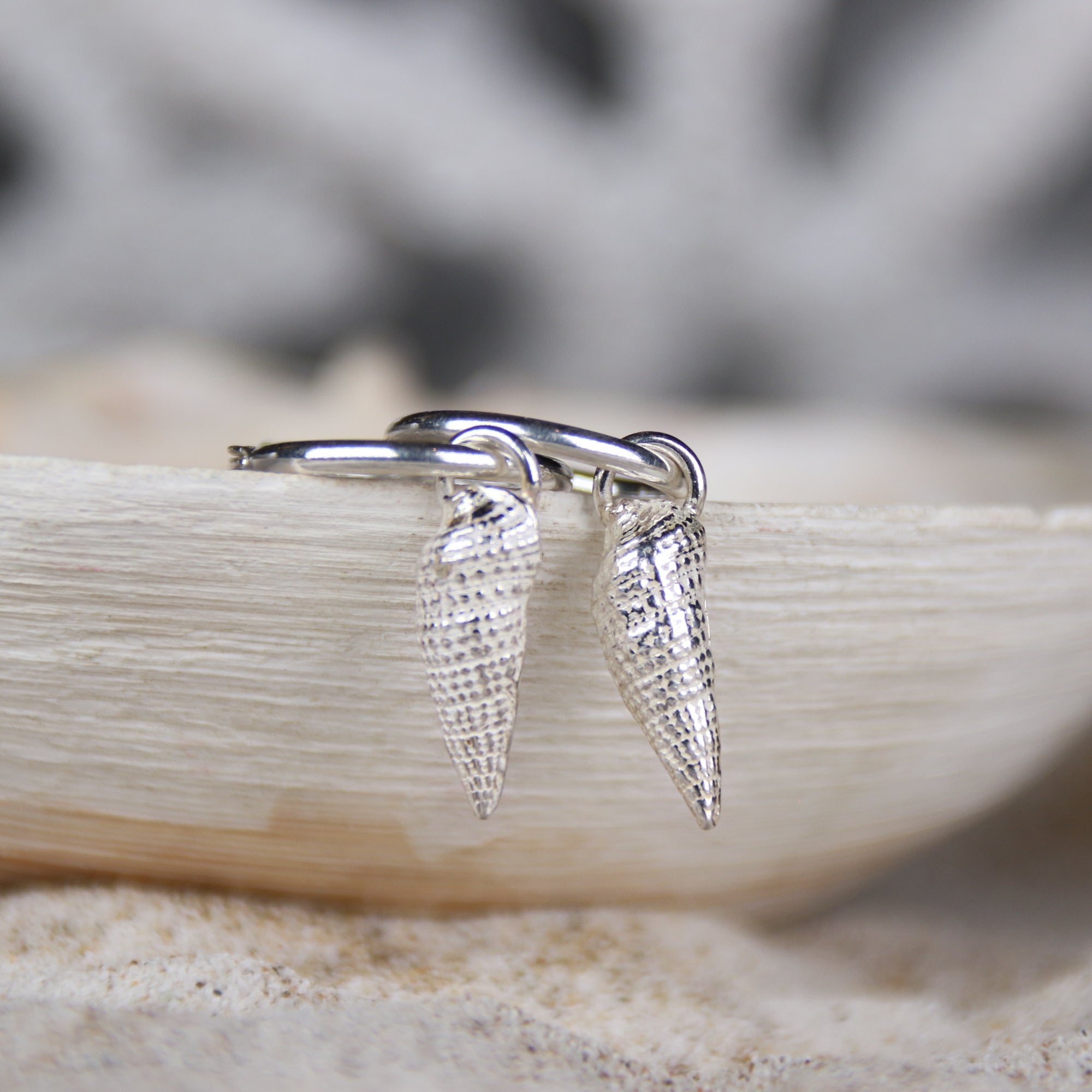 Tide Line Hoops - Two beautiful auger shells cast in fine silver (0.999) creating a unique pair of hoop earrings.