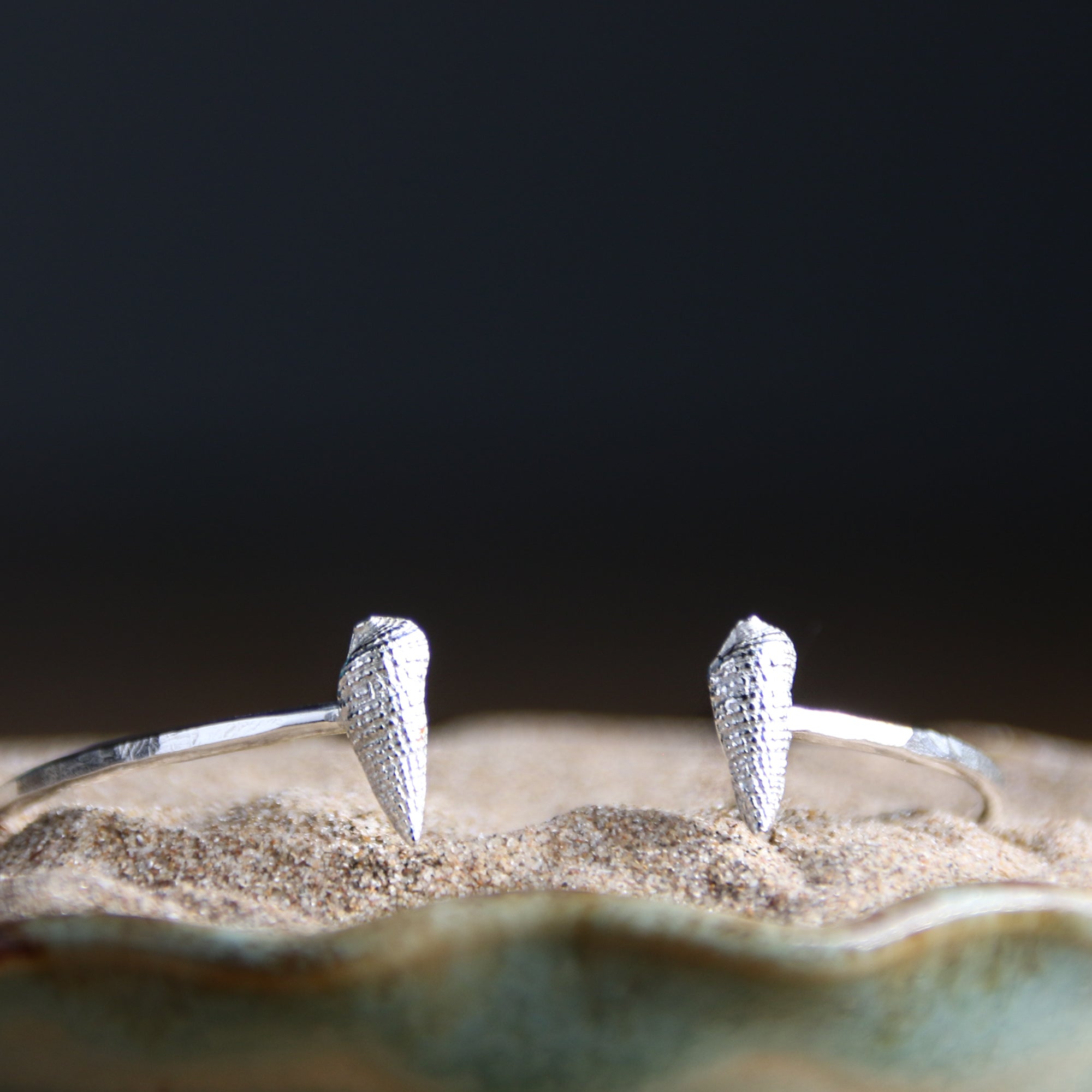 Tidal Pull - Saltwater Souls fine silver (.999) cast auger shells on a hammered effect recycled sterling silver open bangle.
