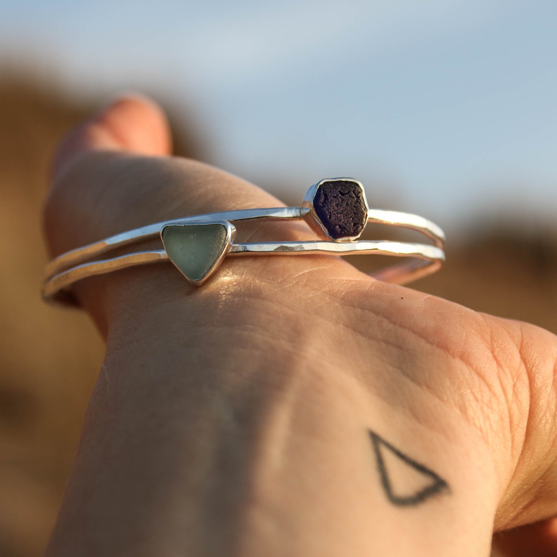 Blue Tides - Saltwater Souls sea glass hammered effect bangle, handcrafted with recycled sterling silver.