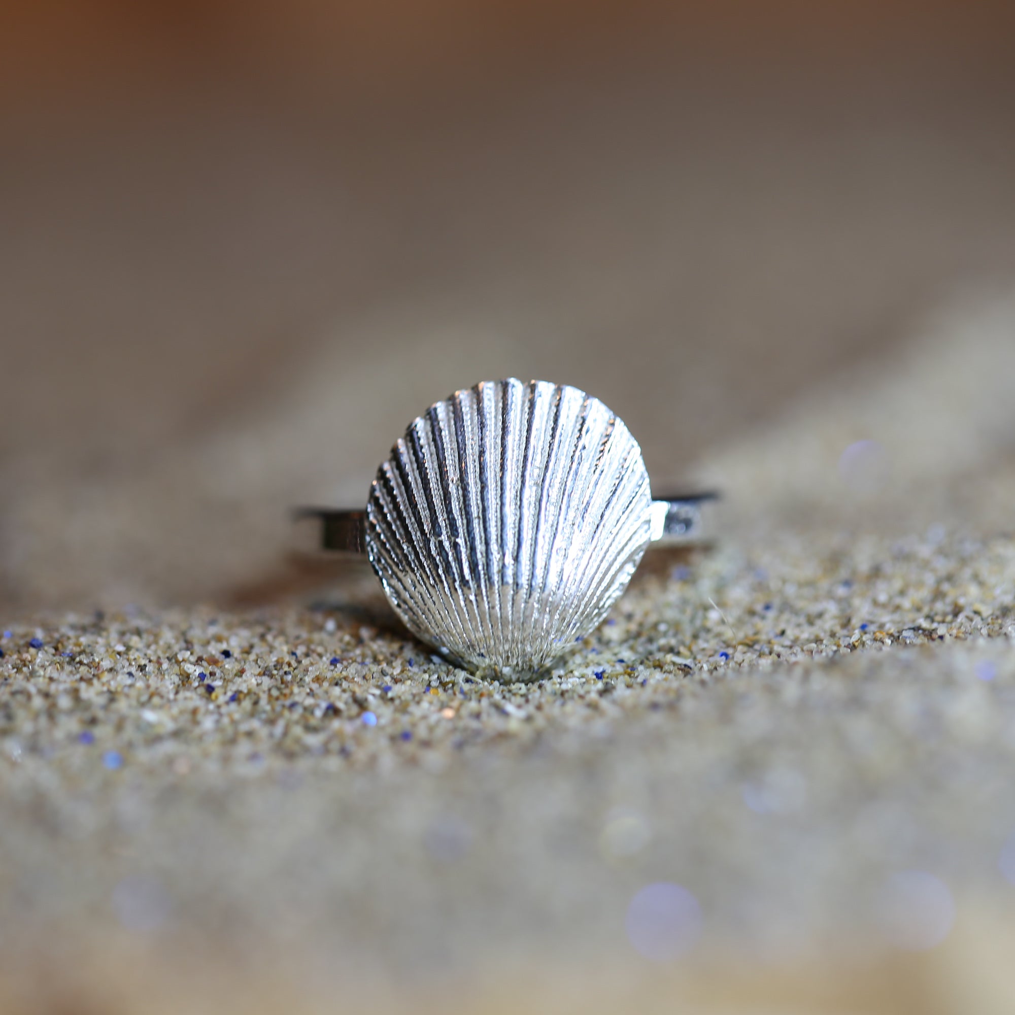 Mermaid's Song Ring- Saltwater Souls fine silver (.999) cast cockle shell on a hammered effect recycled sterling silver stacking ring.