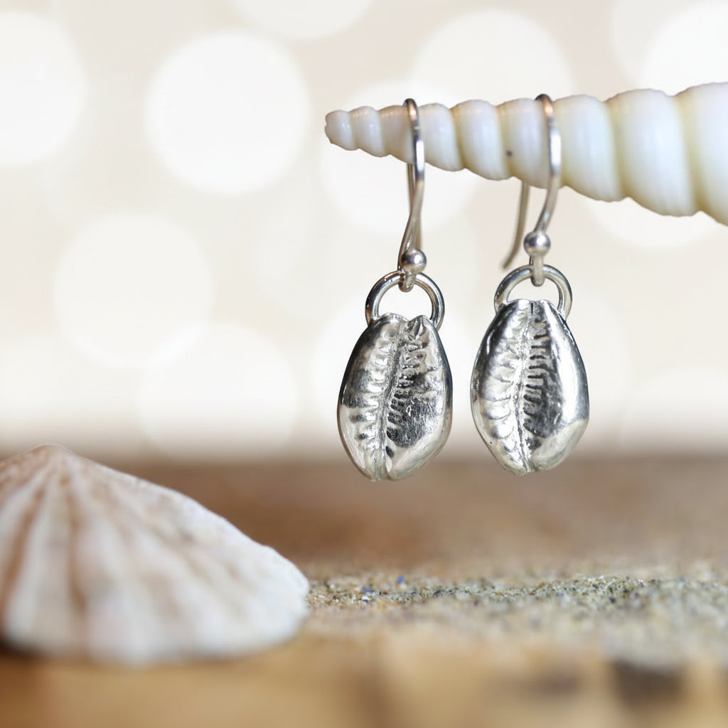 Silver Cowrie Earrings - Saltwater Souls fine silver (.999) cast cowrie shell delicate sterling silver drop earrings.