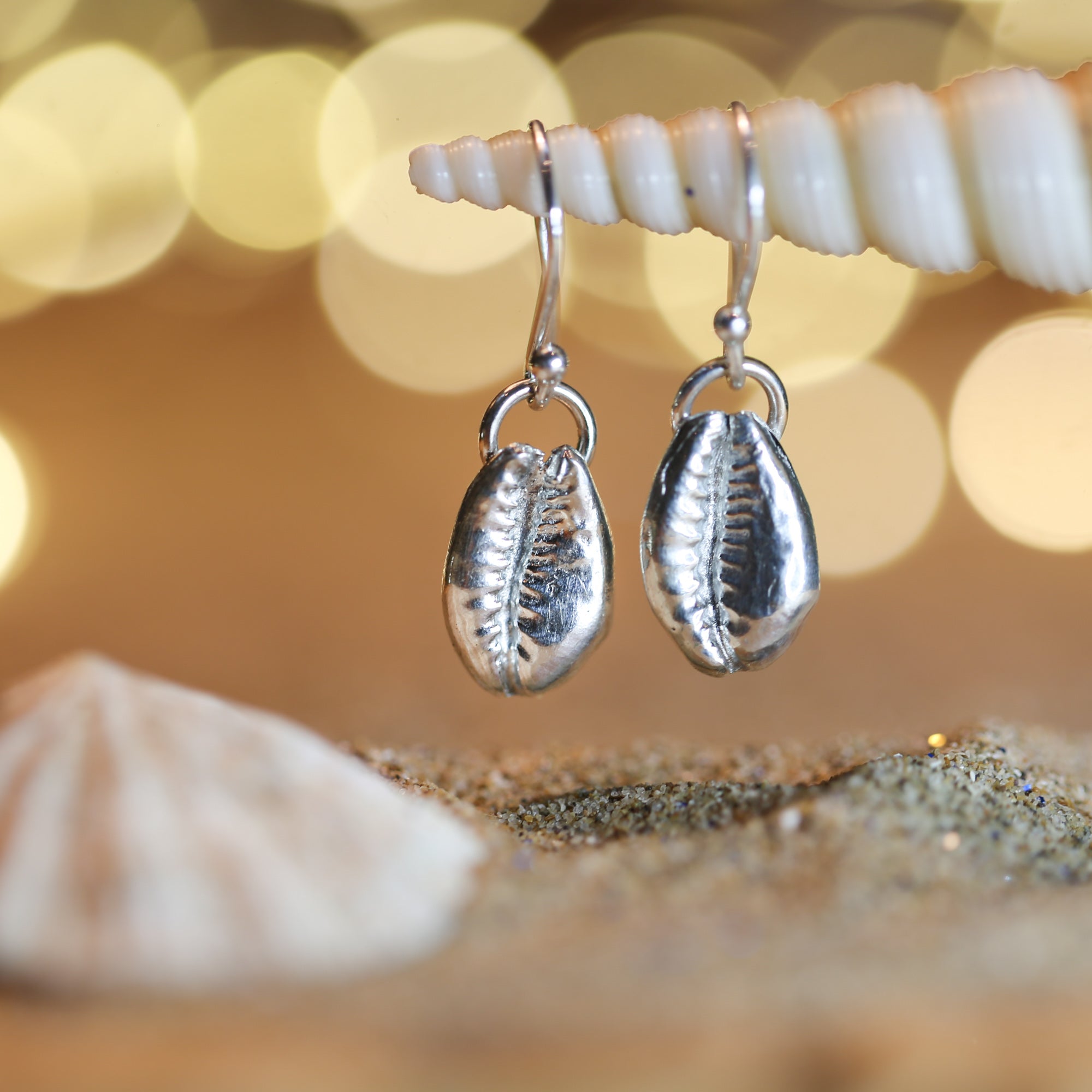 Silver Cowrie Earrings - Saltwater Souls fine silver (.999) cast cowrie shell delicate sterling silver drop earrings.