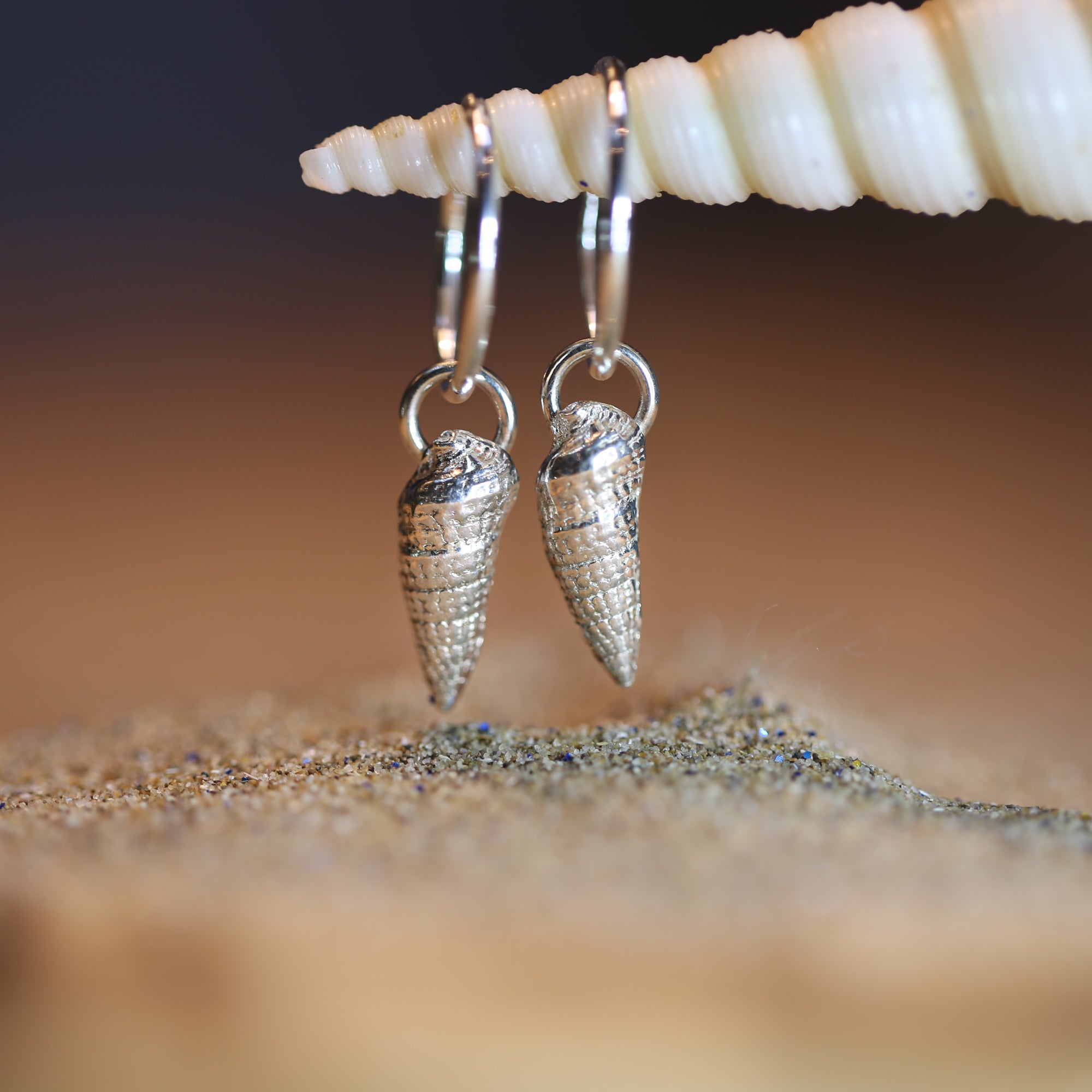 Tide Line Hoops - Two beautiful auger shells cast in fine silver (0.999) creating a unique pair of hoop earrings.
